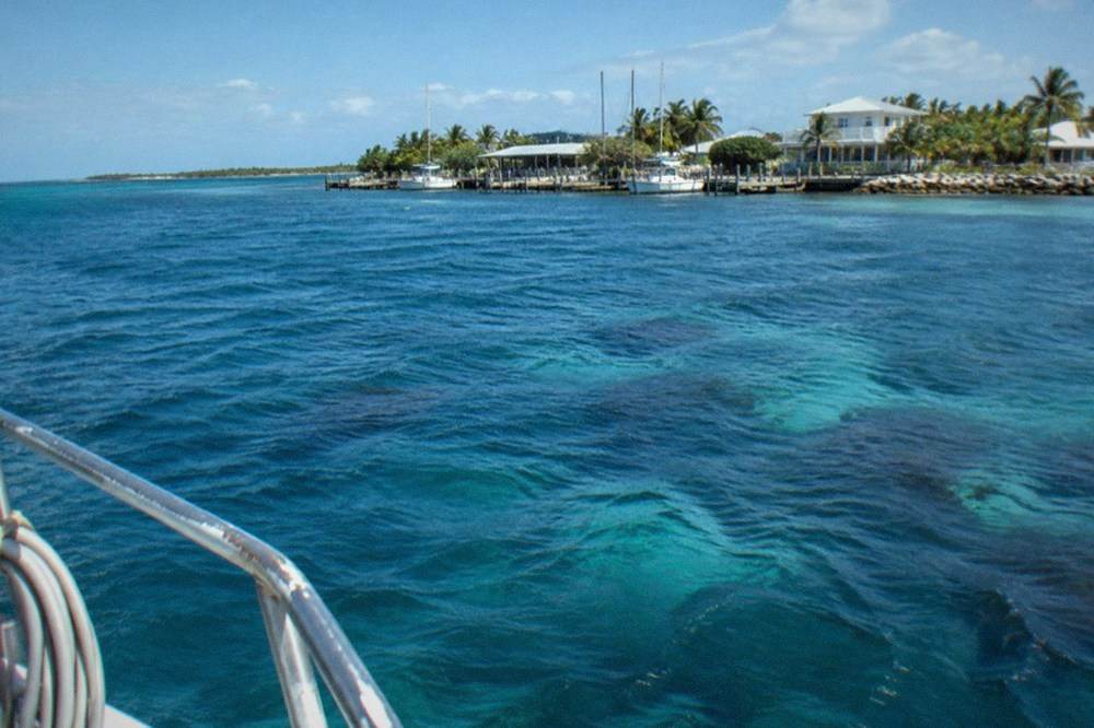 Open blue water at the edge of a coral reef tract in the Florida Keys with scattered patch reefs