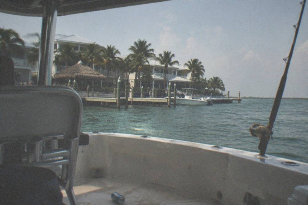Open blue ocean horizon seen from the cockpit of a sportfishing boat
